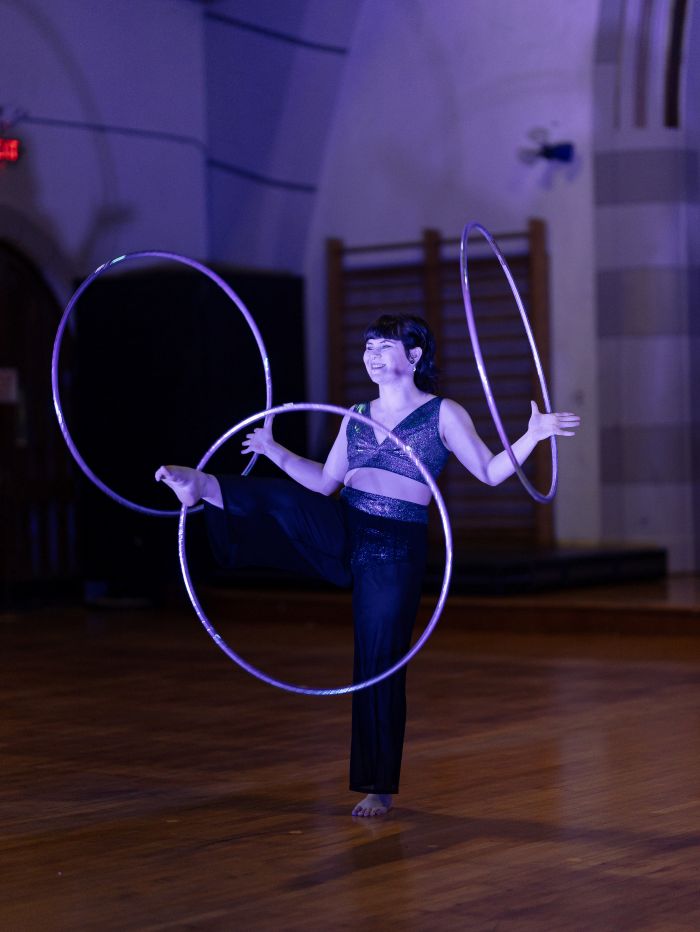 Gail O'Briend spinning three hula hoops